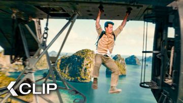 Image of Sully Uses the Helicopter to Swing the Flying Pirate Ship - UNCHARTED Clip | Mark Wahlberg